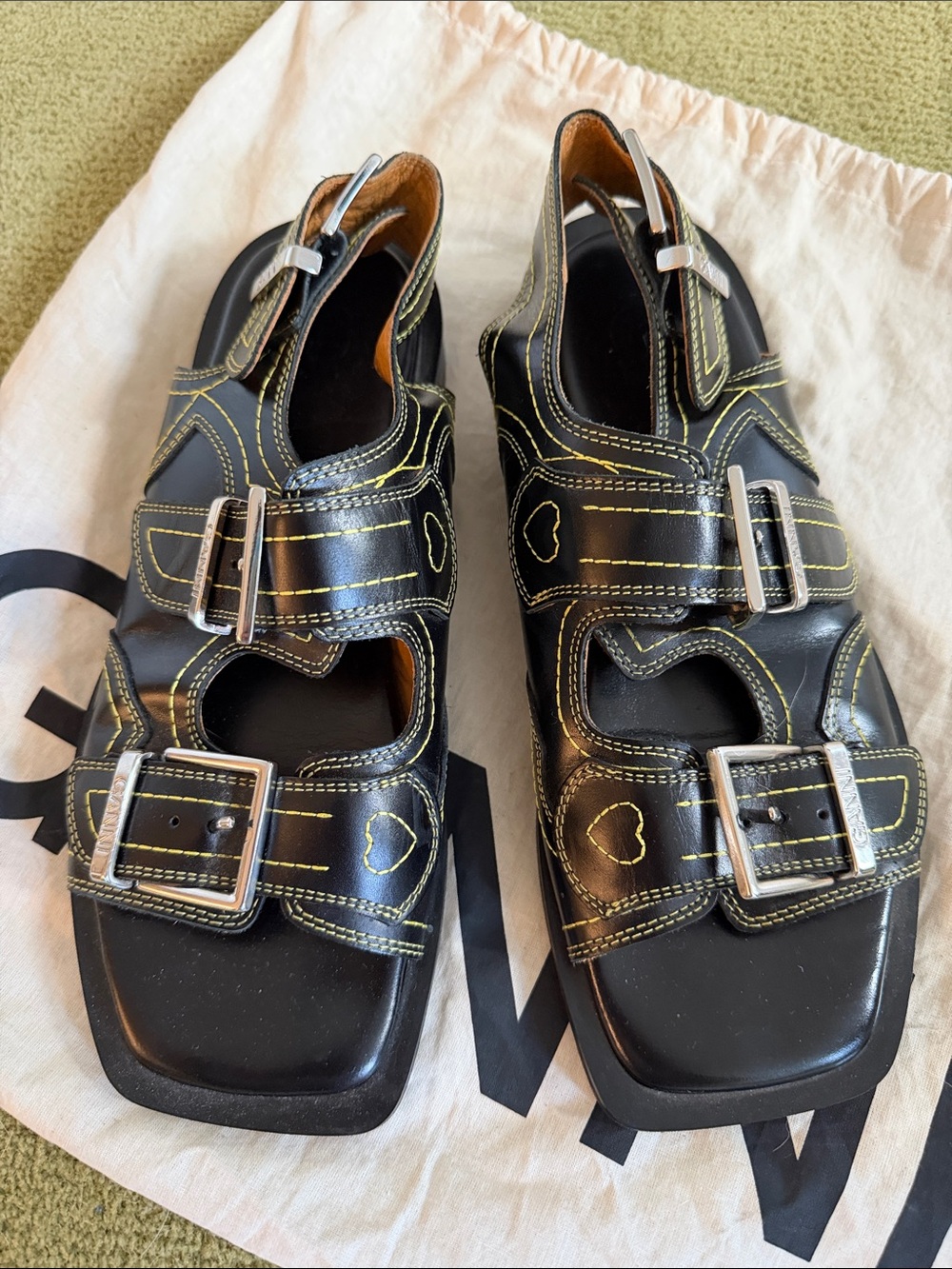 Ganni Black Leather Triple-Buckle Sandals with Heart Stitching - Picture 2 of 4